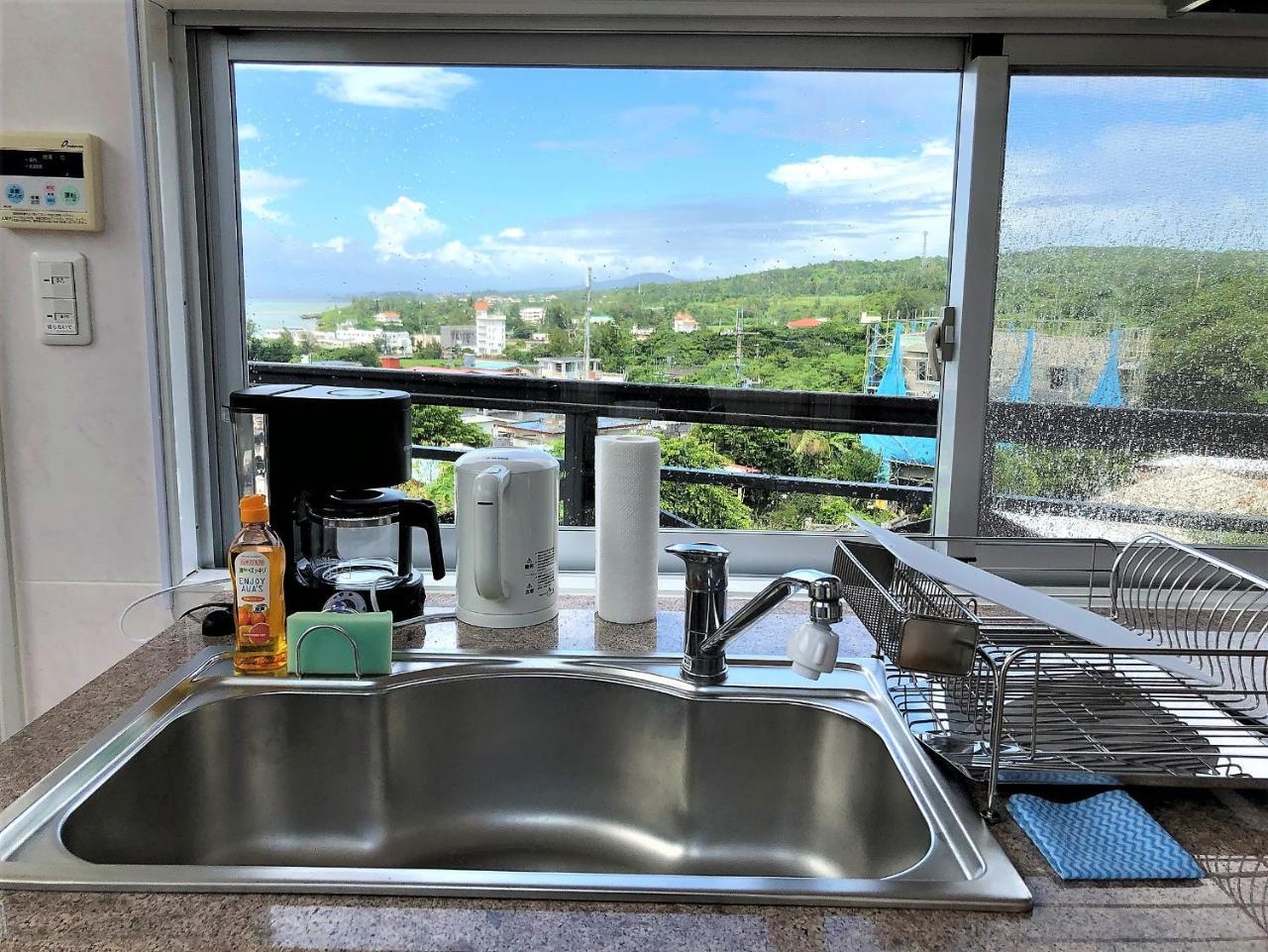 E-Horizon Resort Condominium Йомитан Экстерьер фото