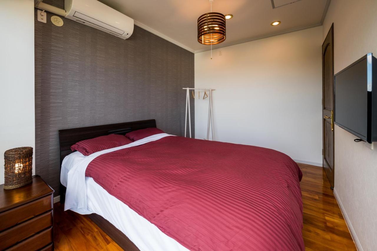E-Horizon Resort Condominium Йомитан Экстерьер фото